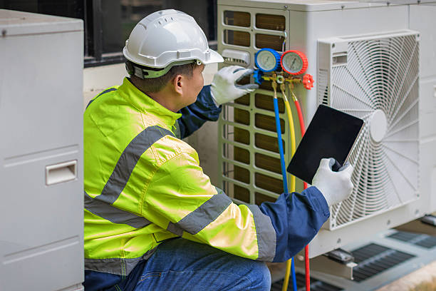 Professional Hvac technician working in Natick, MA